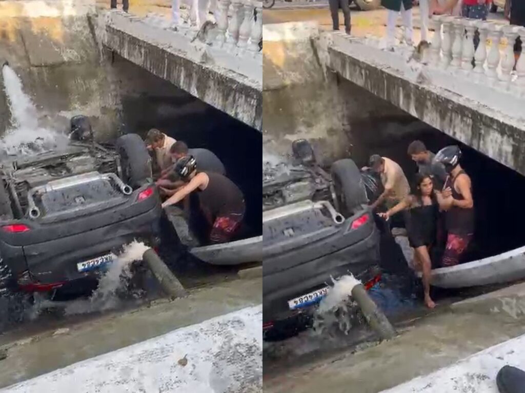 Carro cai no Canal 2 em Santos: moradores resgatam casal