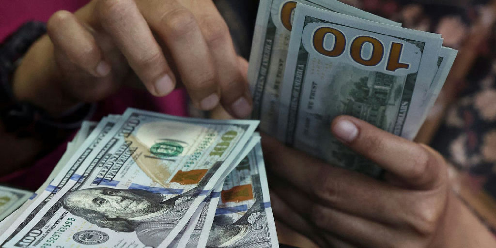 Cotação do dólar cai para R$ 4,97 e atinge menor patamar desde maio após eleições